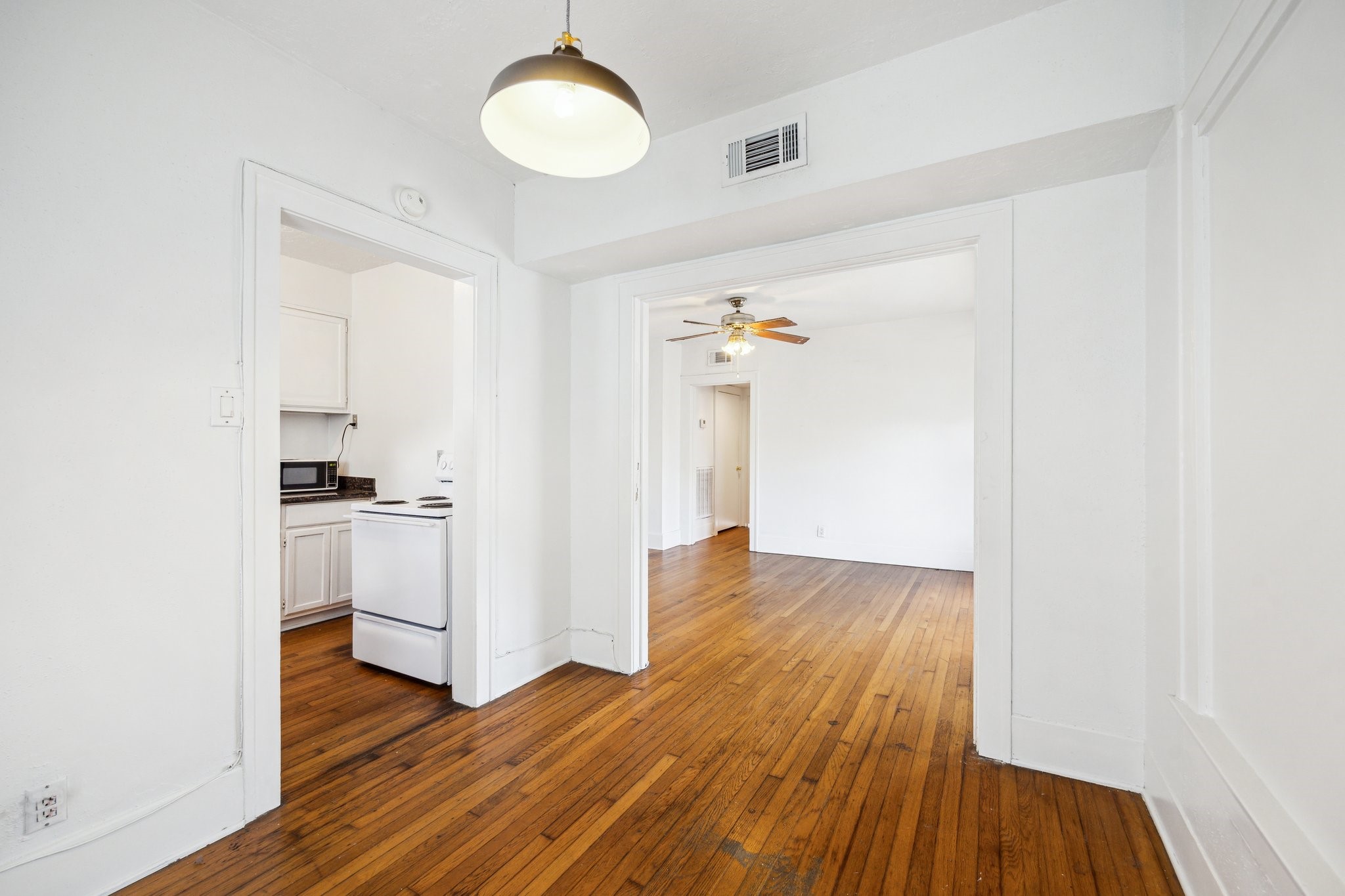 918-920 Peden Street Houston, TX 77006 - Photo 6 of 13 a view of kitchen and wooden floor