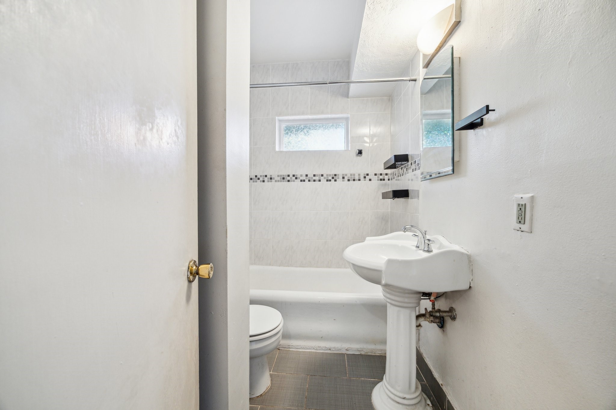 918-920 Peden Street Houston, TX 77006 - Photo 10 of 13 a bathroom with a sink toilet and shower