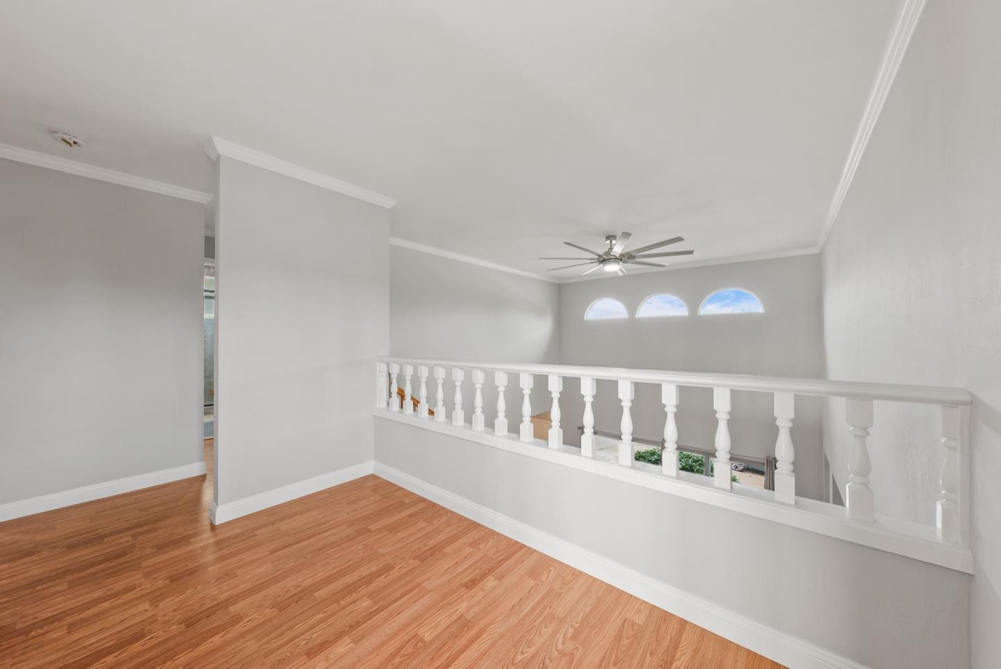 346 Cedar Street Millbrae, CA 94030 - Photo 11 of 43 a view of an empty room with wooden floor and a window