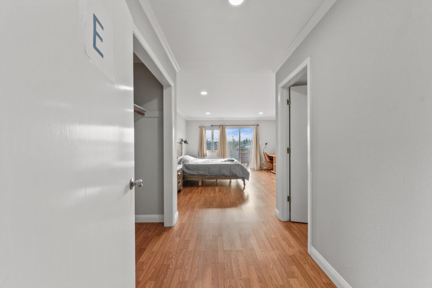 346 Cedar Street Millbrae, CA 94030 - Photo 13 of 43 a hallway with a wooden floor