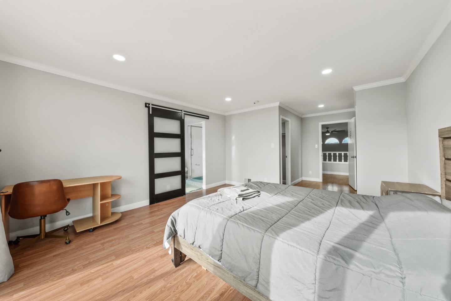 346 Cedar Street Millbrae, CA 94030 - Photo 15 of 43 a bedroom with a bed and a chair