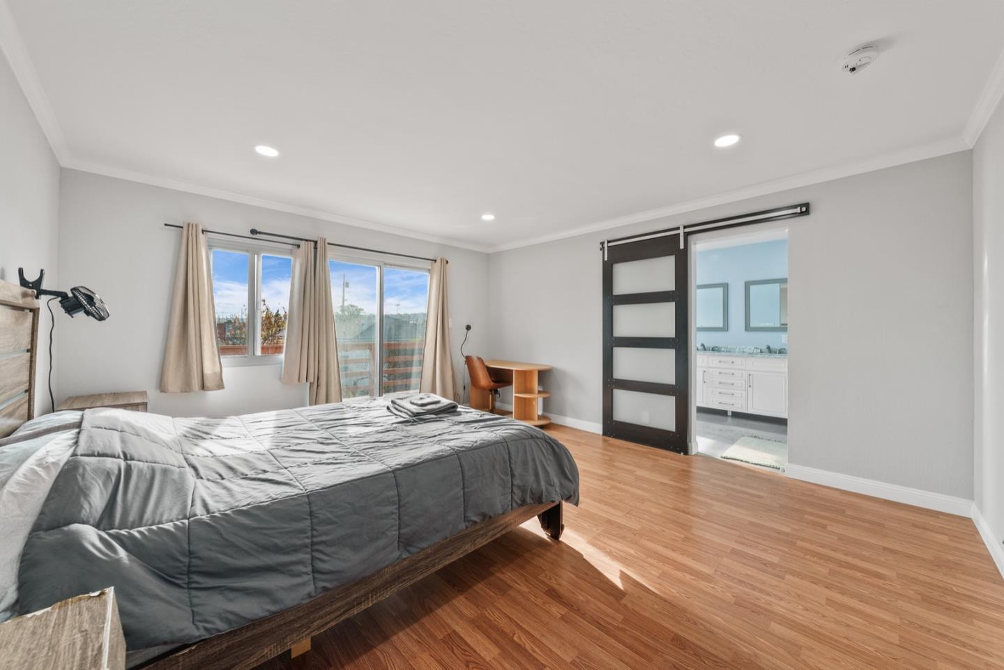 346 Cedar Street Millbrae, CA 94030 - Photo 16 of 43 a bedroom with a large bed and a window