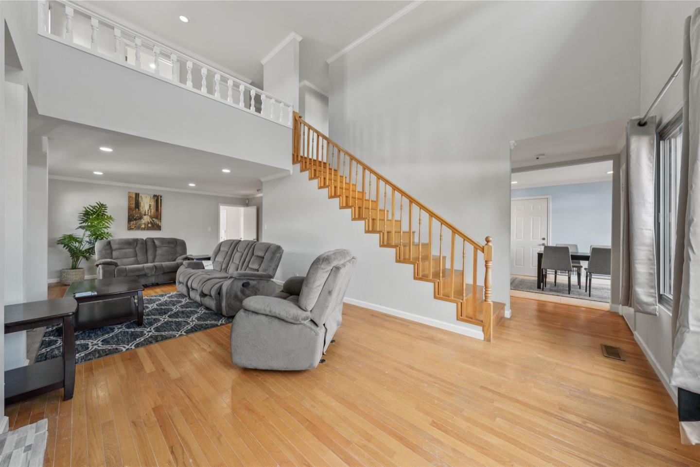 346 Cedar Street Millbrae, CA 94030 - Photo 2 of 43 a living room with furniture and a wooden floor
