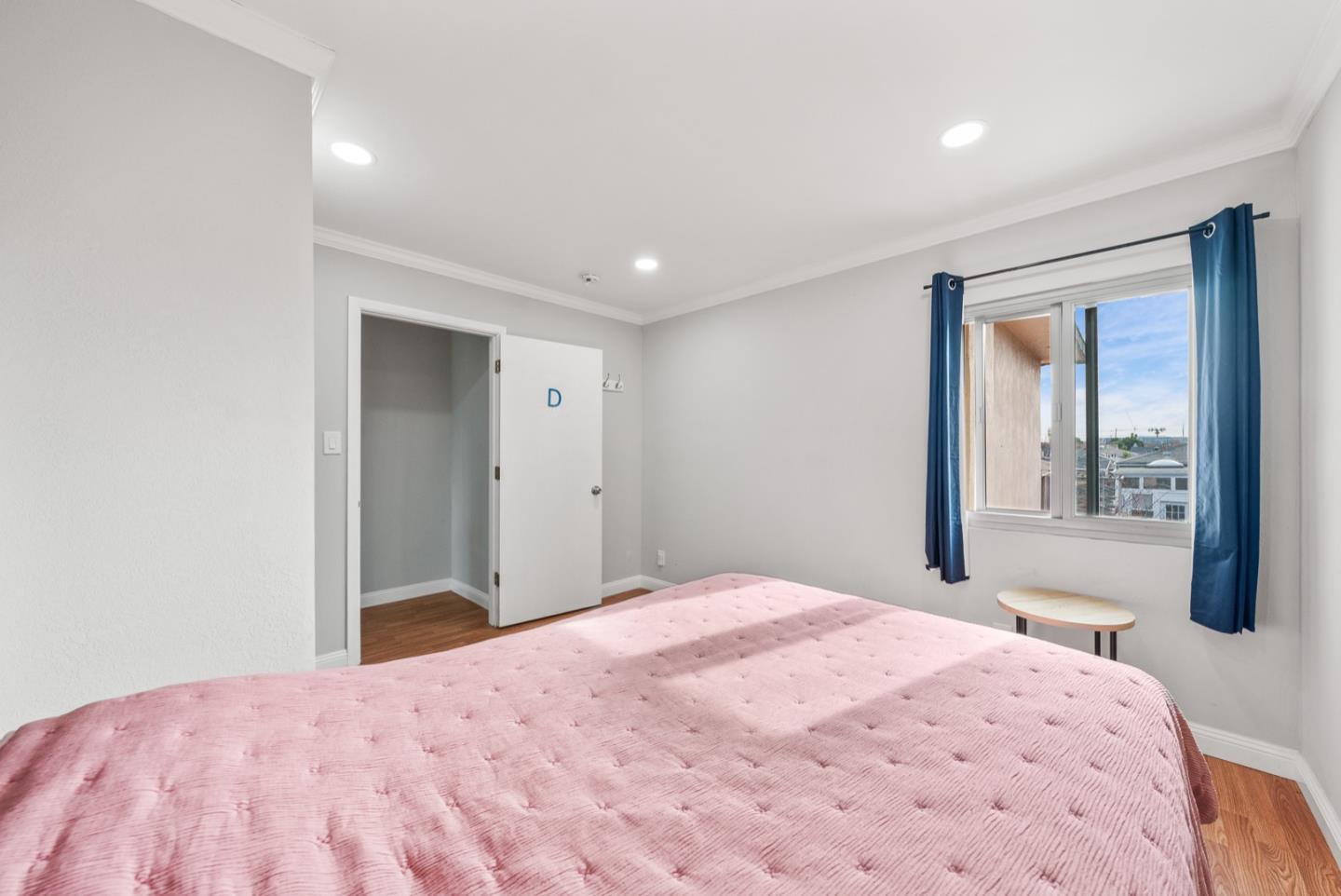 346 Cedar Street Millbrae, CA 94030 - Photo 24 of 43 a bedroom with a large bed and a large window