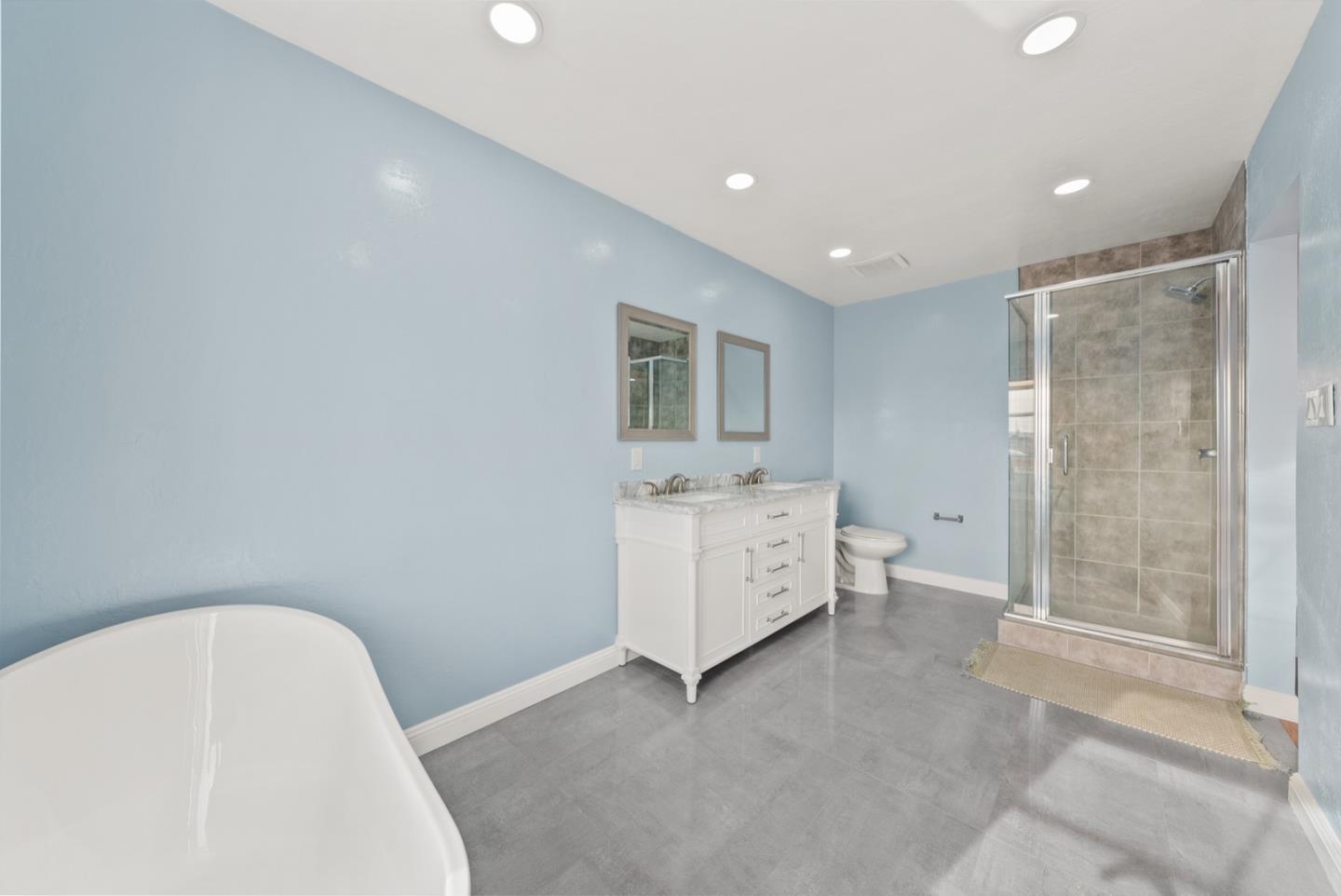 346 Cedar Street Millbrae, CA 94030 - Photo 26 of 43 a bathroom with a bathtub sink and mirror