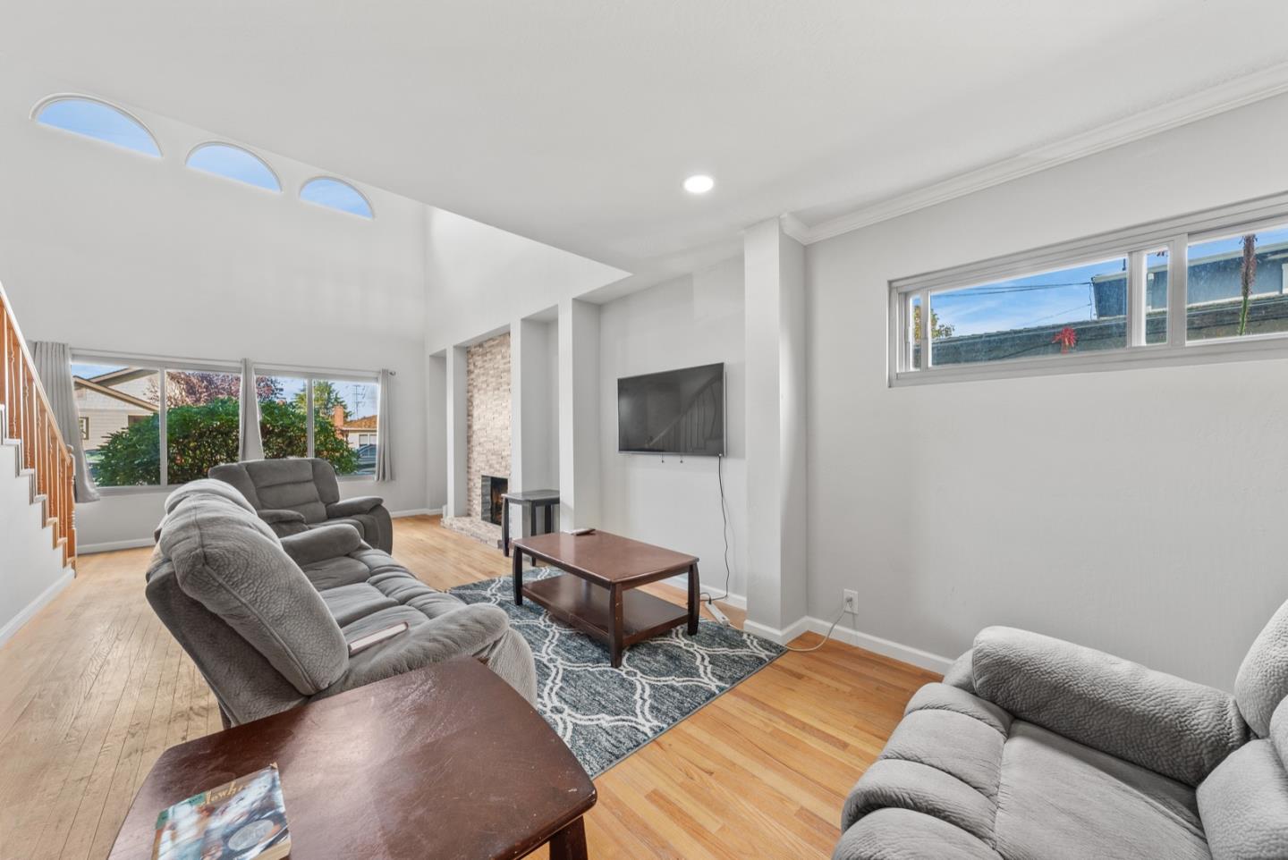 346 Cedar Street Millbrae, CA 94030 - Photo 3 of 43 a living room with furniture or couch and a flat screen tv