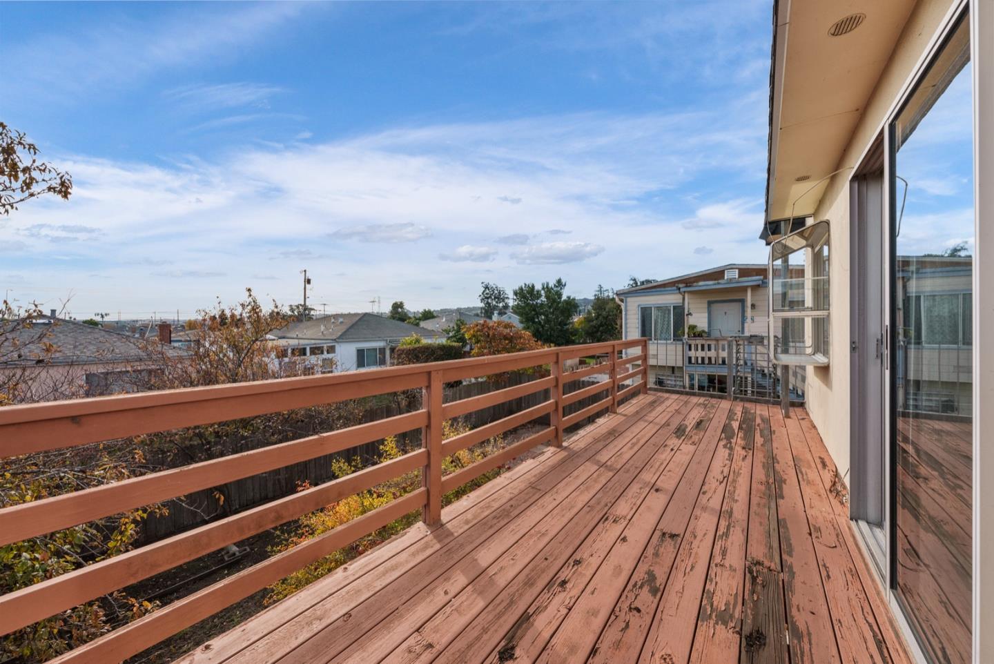 346 Cedar Street Millbrae, CA 94030 - Photo 34 of 43 a view of balcony with wooden floor and city view
