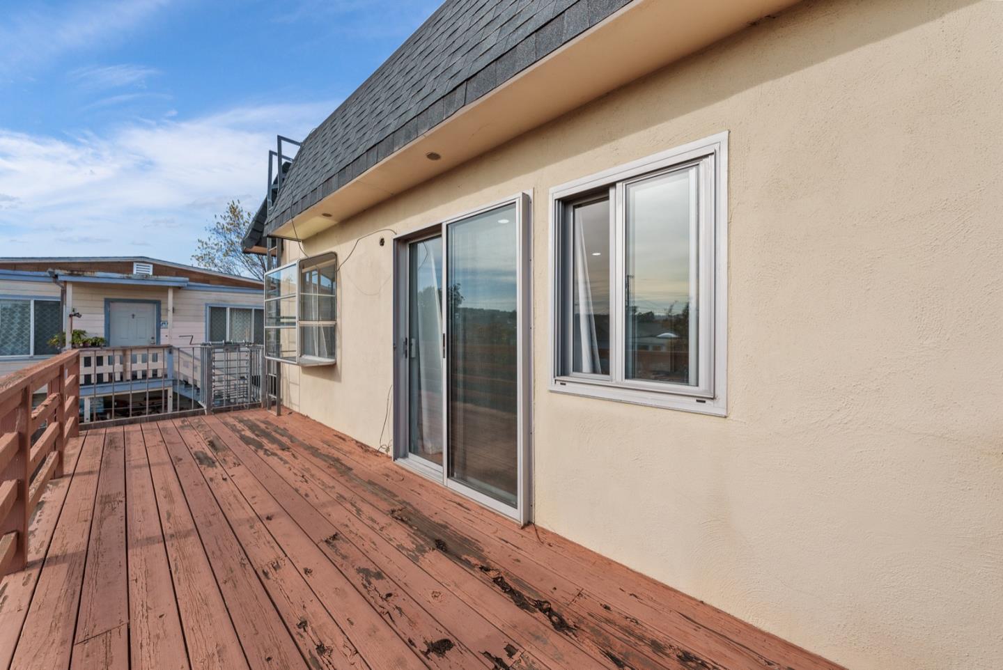 346 Cedar Street Millbrae, CA 94030 - Photo 35 of 43 a view of backyard with a deck and wooden floor
