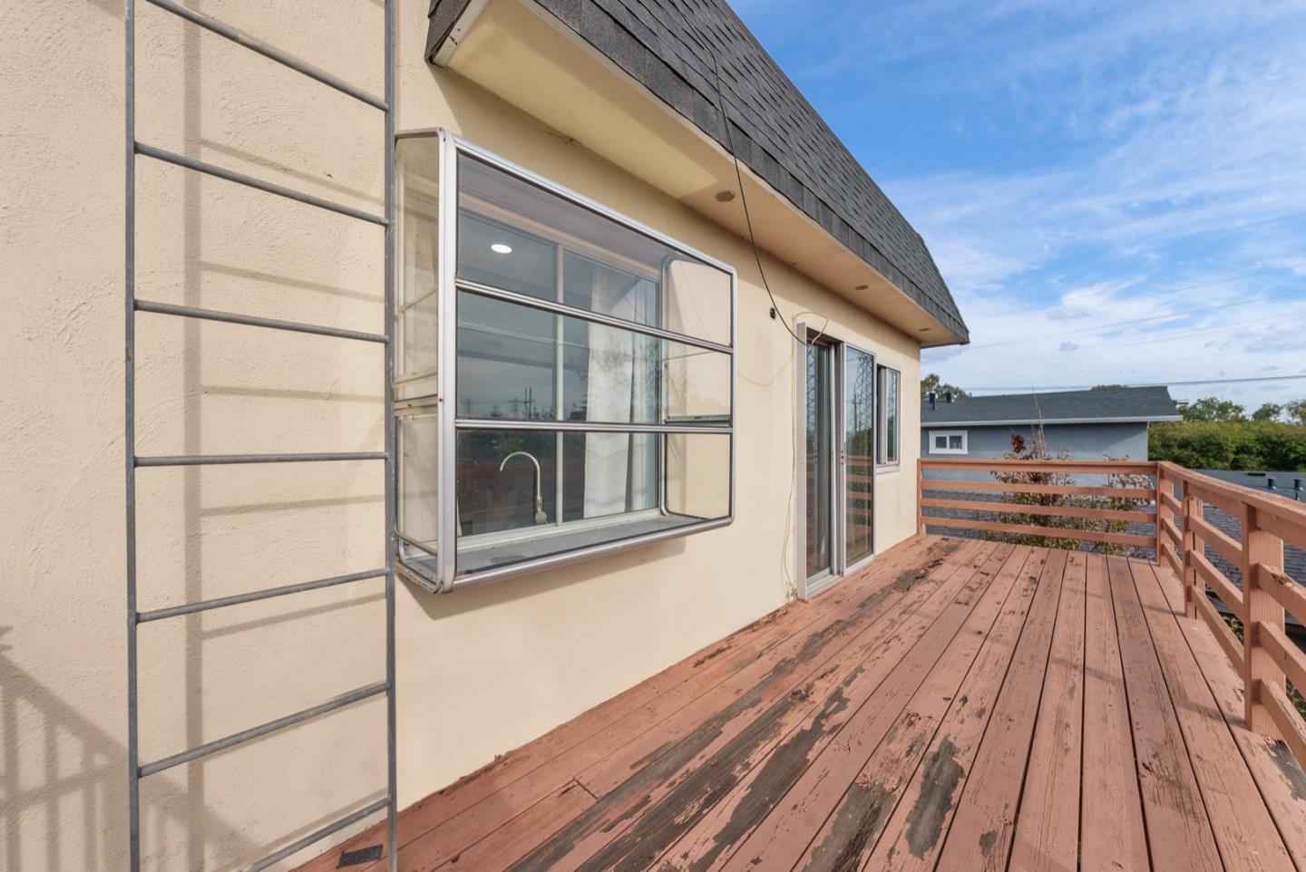346 Cedar Street Millbrae, CA 94030 - Photo 36 of 43 a view of a house with a wooden deck