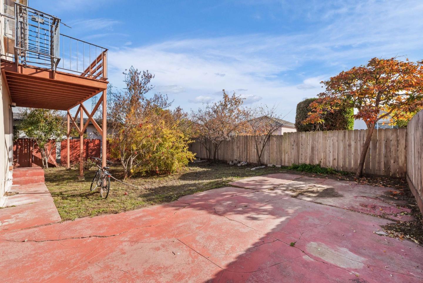 346 Cedar Street Millbrae, CA 94030 - Photo 40 of 43 a backyard of a house with table and chairs