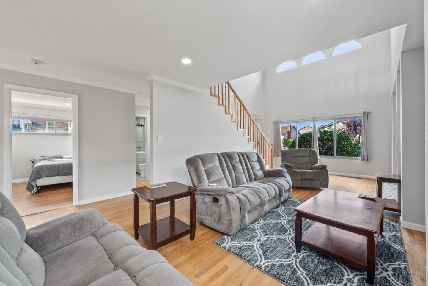346 Cedar Street Millbrae, CA 94030 - Photo 4 of 43 a living room with furniture and a large window