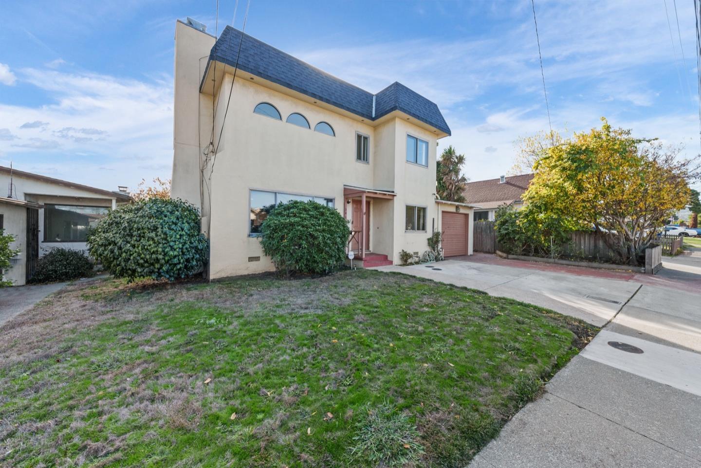 346 Cedar Street Millbrae, CA 94030 - Photo 42 of 43 a front view of a house with a yard and trees