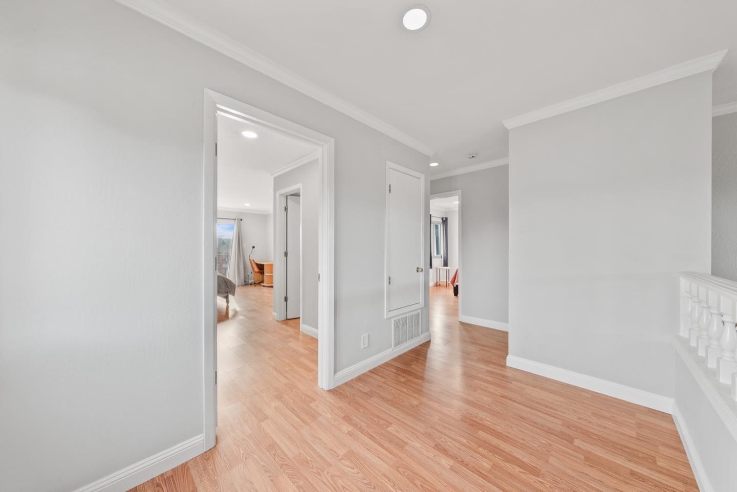 346 Cedar Street Millbrae, CA 94030 - Photo 10 of 43 a view of a hallway with wooden floor