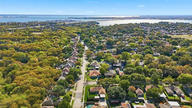 an aerial view of a city with lots of residential buildings