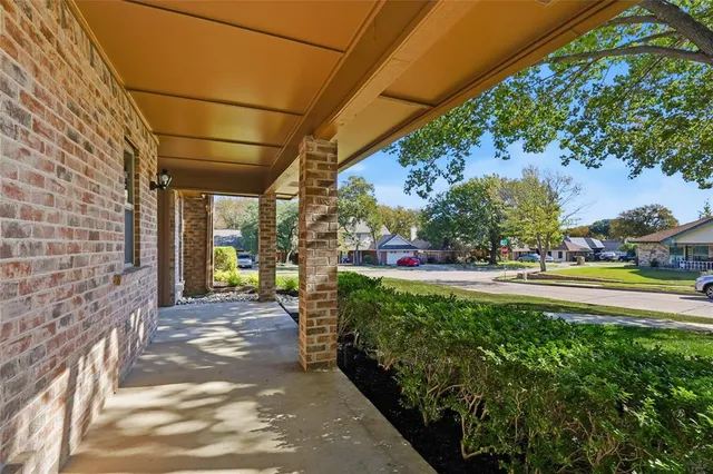a view of a garden with pathway