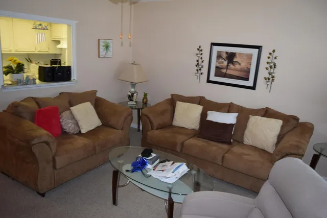 a living room with furniture and a couch
