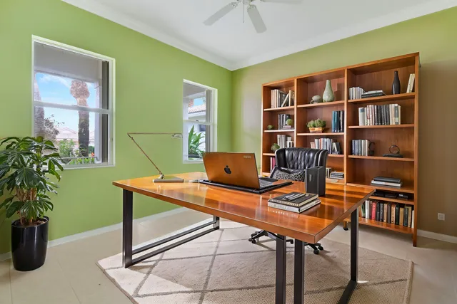 a view of a workspace with furniture