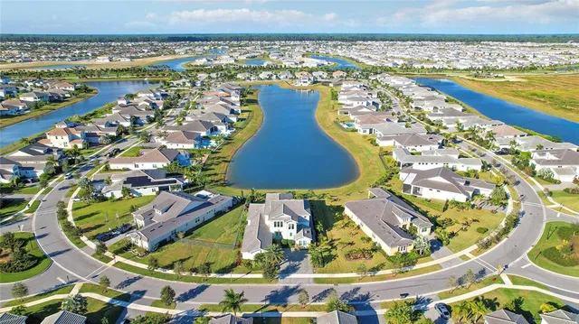 a view of a city with an ocean view
