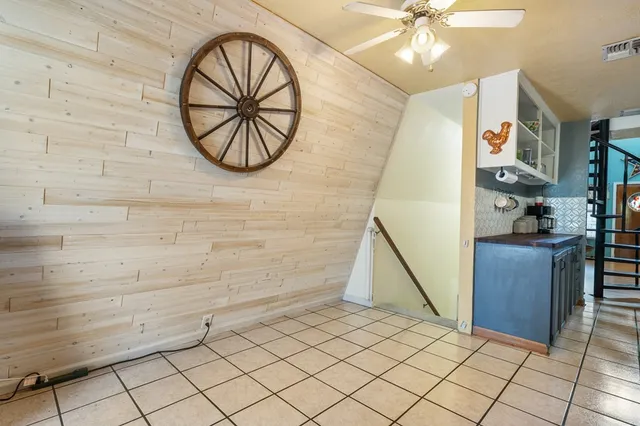 a view of a livingroom with furniture and entryway