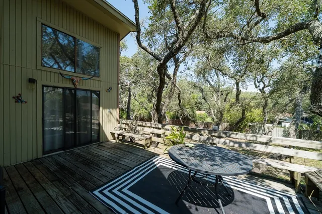 a view of a chairs and tables on the deck