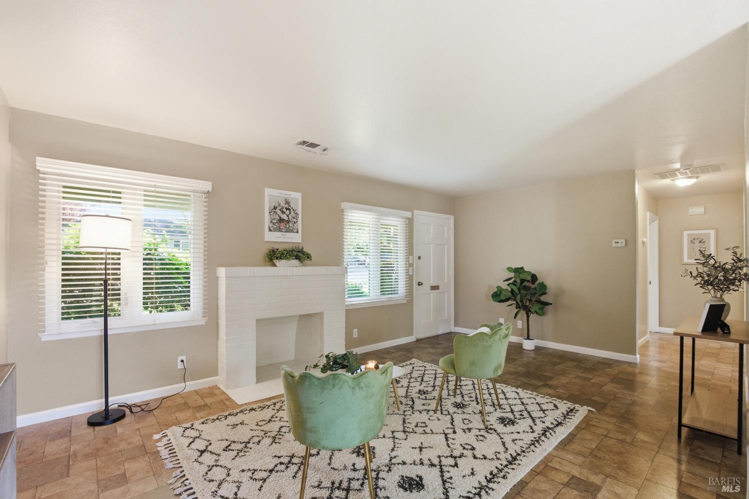 2015 Locust Street Napa, CA 94559 - Photo 14 of 54 a living room with furniture and a potted plant