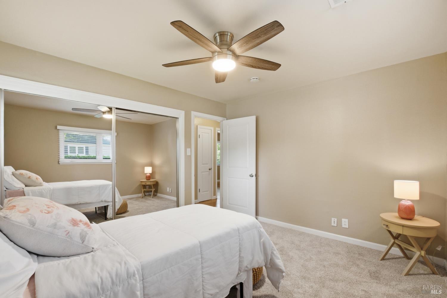 2015 Locust Street Napa, CA 94559 - Photo 21 of 54 a bedroom with a bed and a ceiling fan