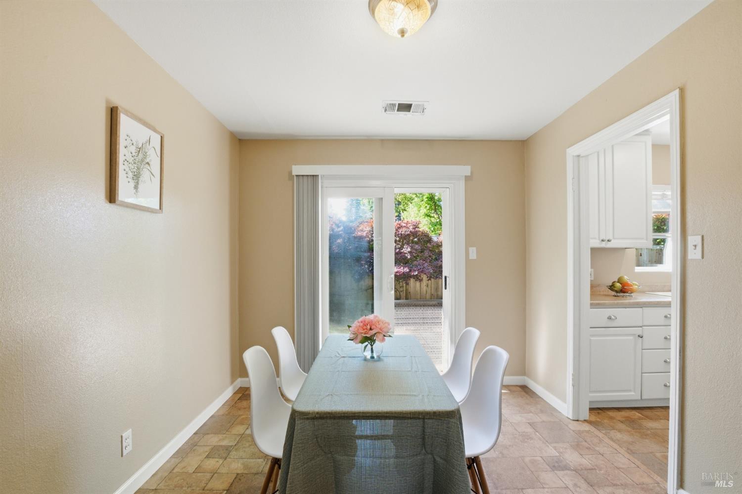 2015 Locust Street Napa, CA 94559 - Photo 22 of 54 a dining room with furniture and window