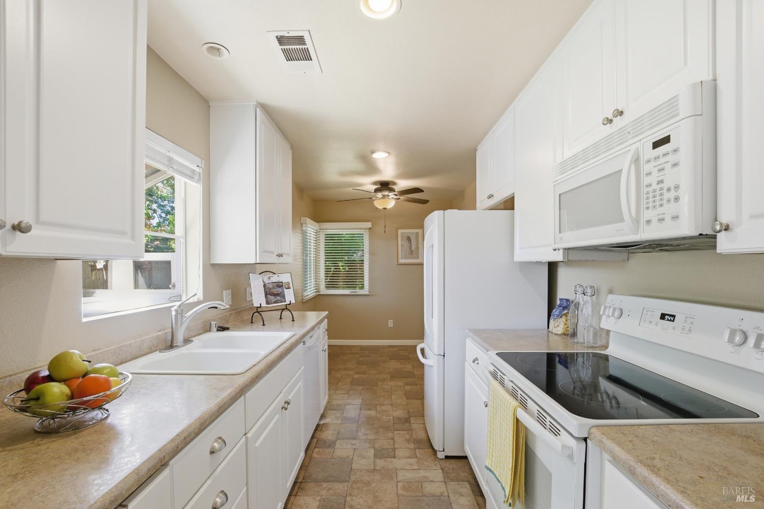 2015 Locust Street Napa, CA 94559 - Photo 26 of 54 a kitchen with a sink stove and cabinets
