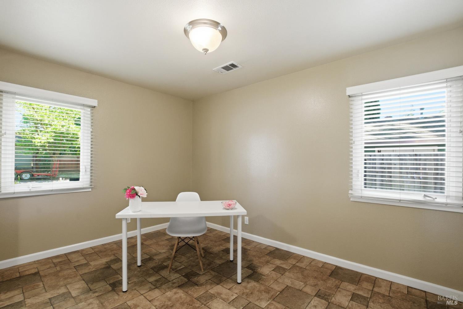 2015 Locust Street Napa, CA 94559 - Photo 36 of 54 a dining room with furniture and window