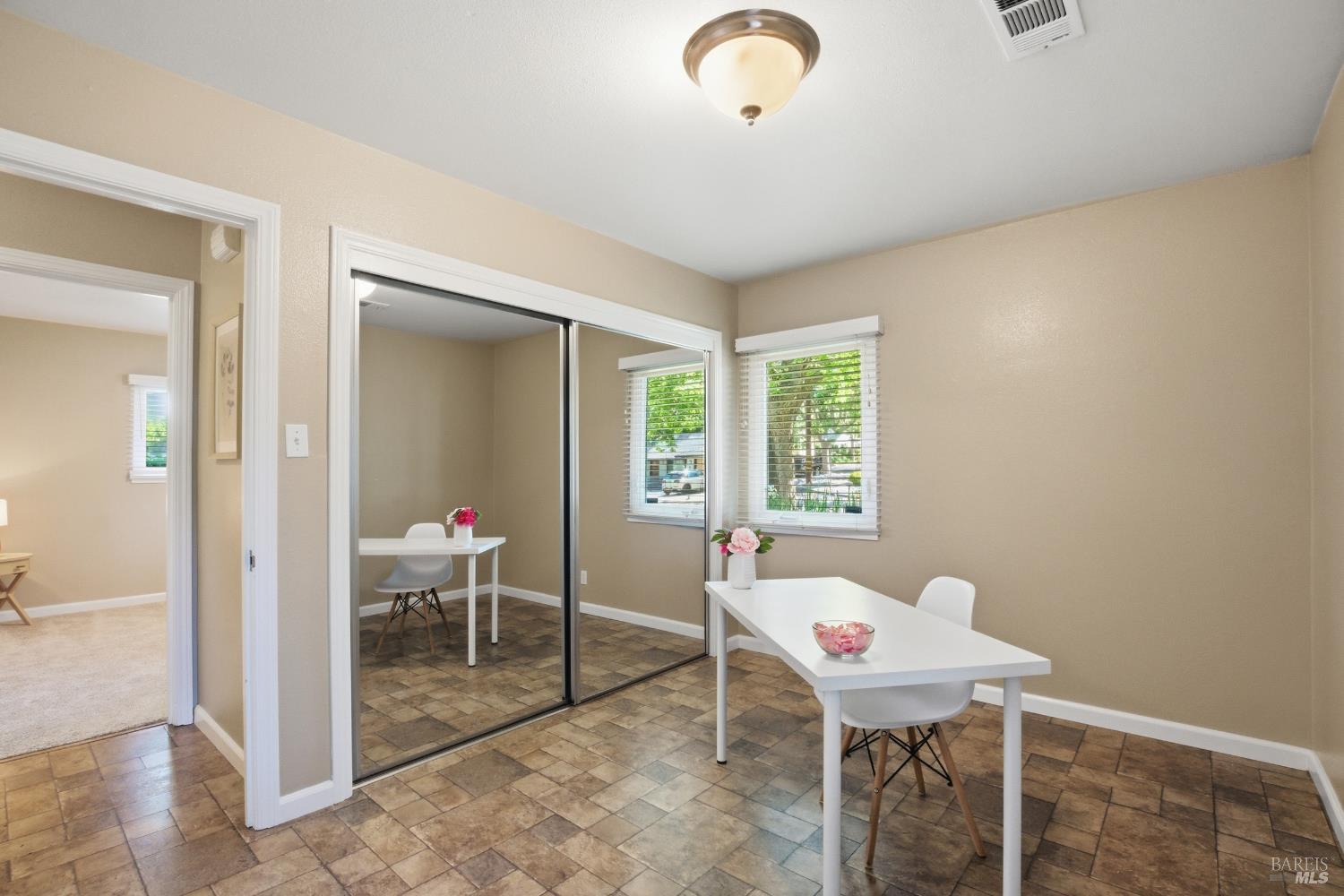 2015 Locust Street Napa, CA 94559 - Photo 37 of 54 a room with a table and chairs