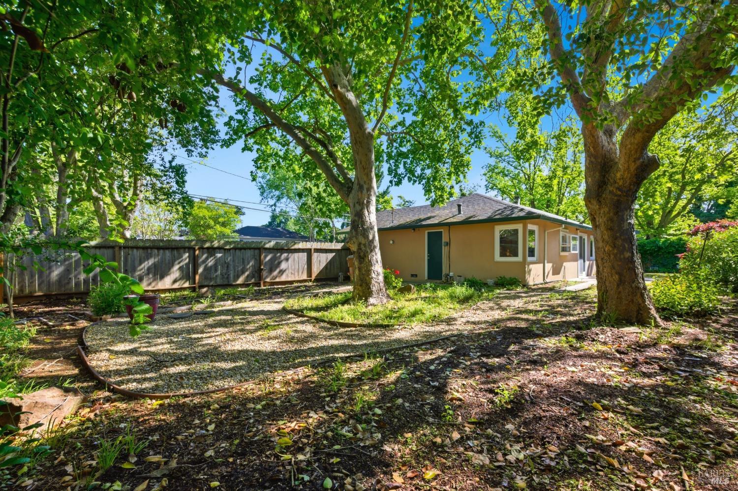 2015 Locust Street Napa, CA 94559 - Photo 39 of 54 a backyard of a house with table and chairs