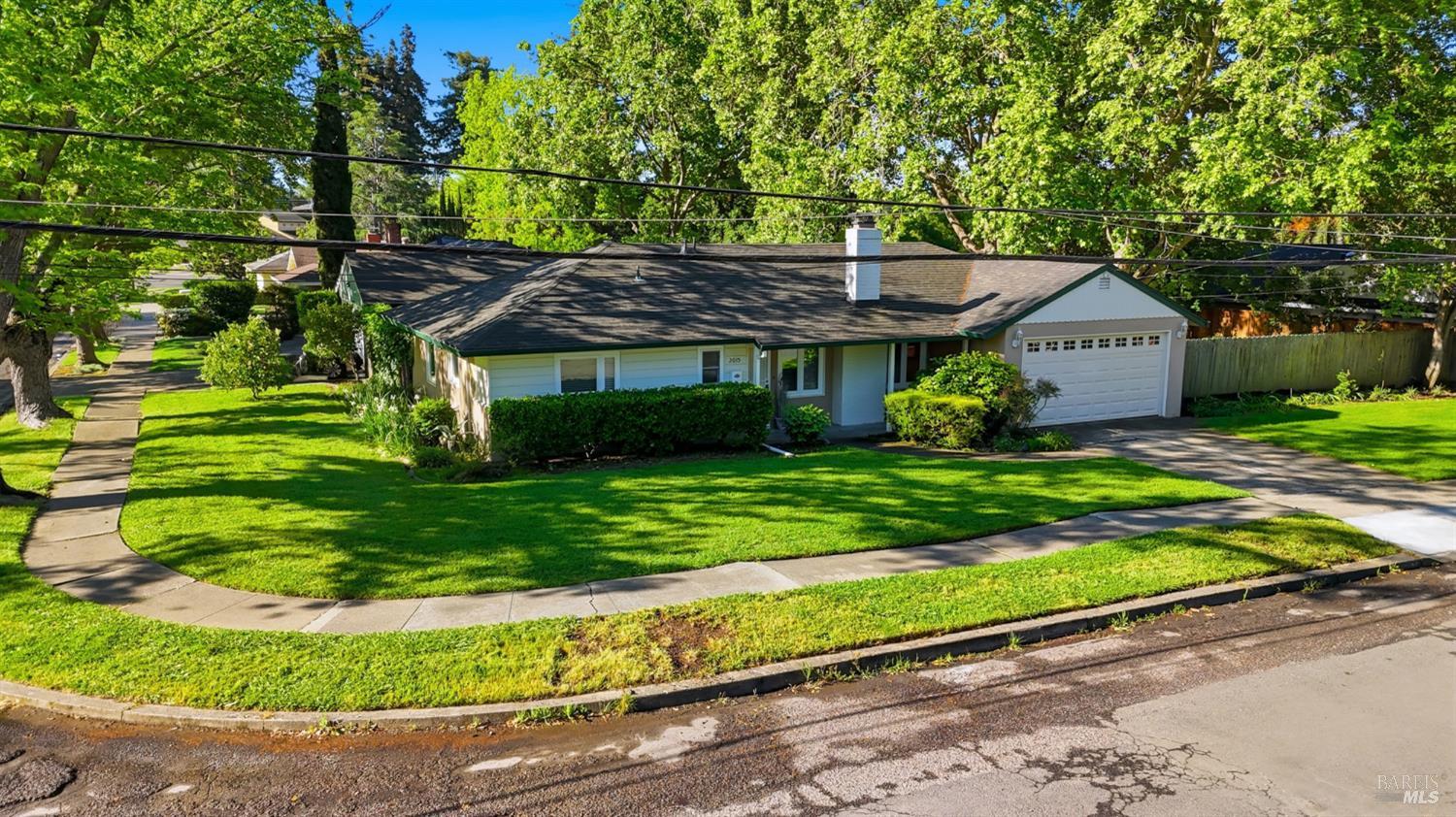 2015 Locust Street Napa, CA 94559 - Photo 46 of 54 a front view of a house with a yard