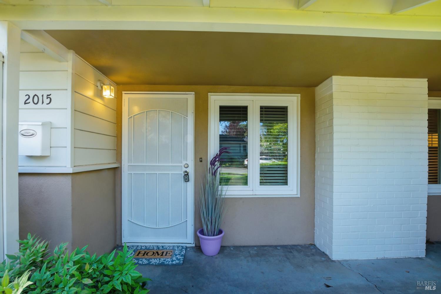 2015 Locust Street Napa, CA 94559 - Photo 5 of 54 a front view of a house with a garage