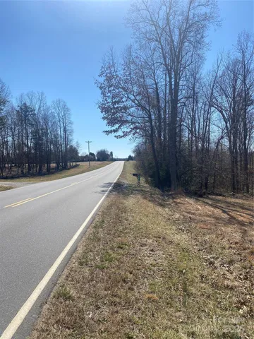 a view of a backyard of the house