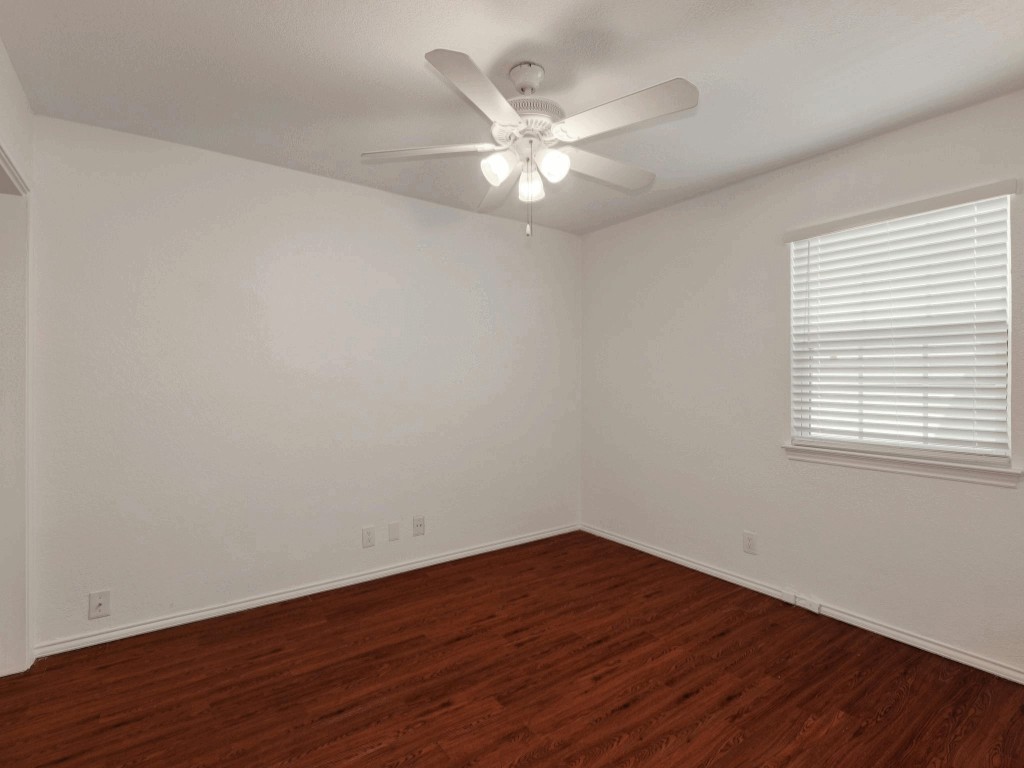 913 Sirocco Drive, Unit A & B Austin, TX 78745 - Photo 14 of 39 a view of a room with wooden floor and fan