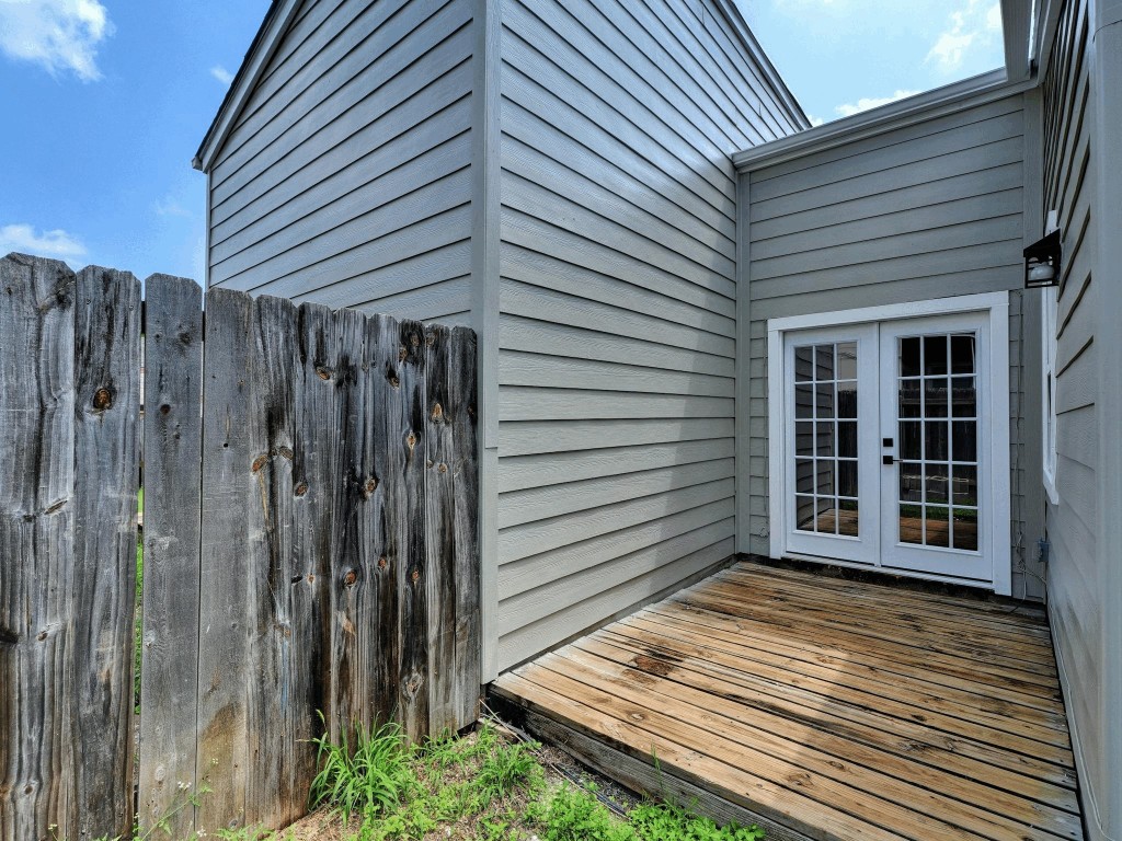 913 Sirocco Drive, Unit A & B Austin, TX 78745 - Photo 24 of 39 a view of a backyard with wooden fence