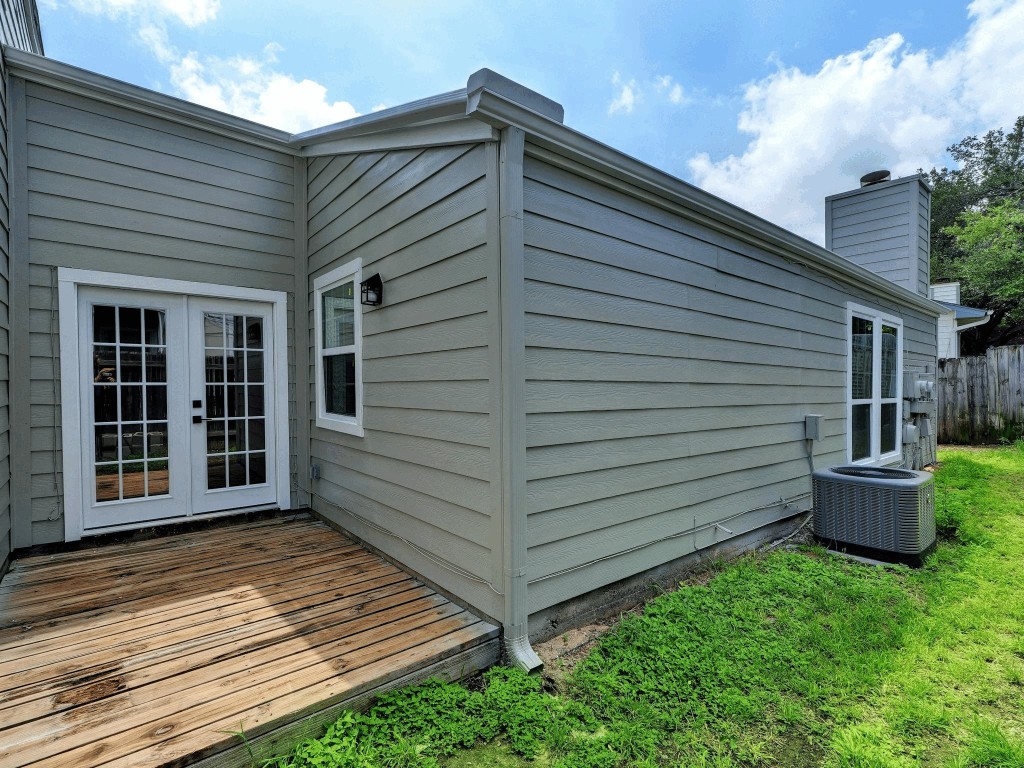 913 Sirocco Drive, Unit A & B Austin, TX 78745 - Photo 26 of 39 a view of a back yard of the house