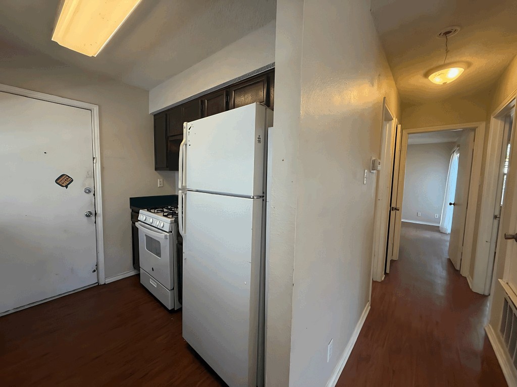 913 Sirocco Drive, Unit A & B Austin, TX 78745 - Photo 33 of 39 a view of a storage & utility room with wooden floor