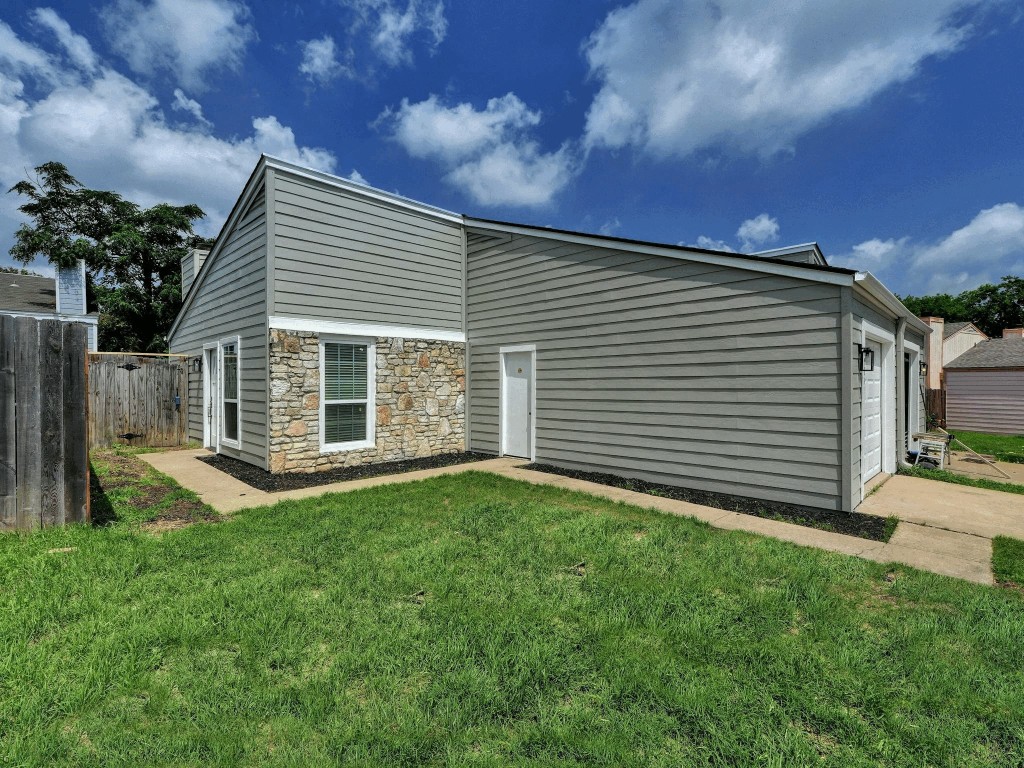 913 Sirocco Drive, Unit A & B Austin, TX 78745 - Photo 6 of 39 a view of a house with a backyard