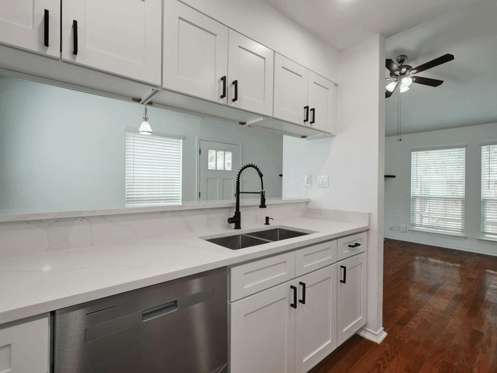 913 Sirocco Drive, Unit A & B Austin, TX 78745 - Photo 10 of 39 a kitchen with a sink and cabinets