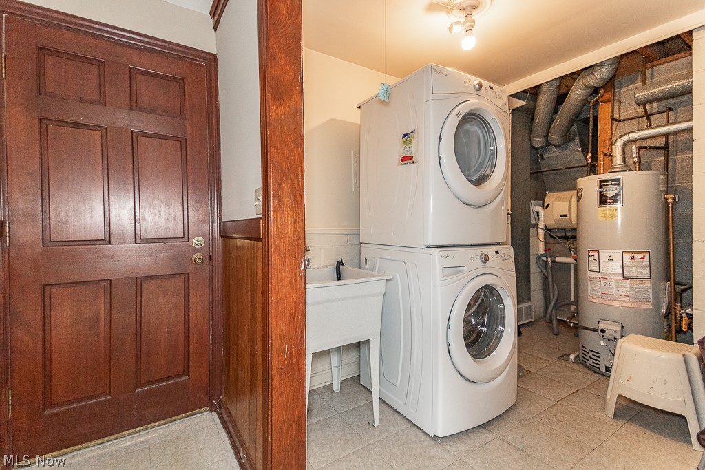 7111 Chillicothe Road Mentor, OH 44060 - Photo 19 of 23 Laundry area just off the garage featuring newer washer and dryer, both stay!