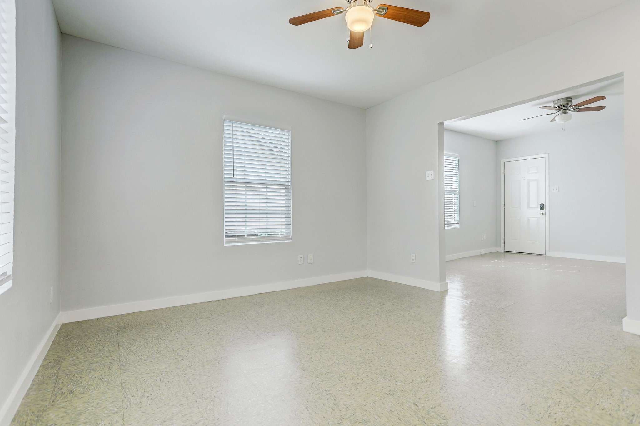 3345 Reeves Street, Unit A Houston, TX 77004 - Photo 5 of 9 wooden floor in an empty room with a window