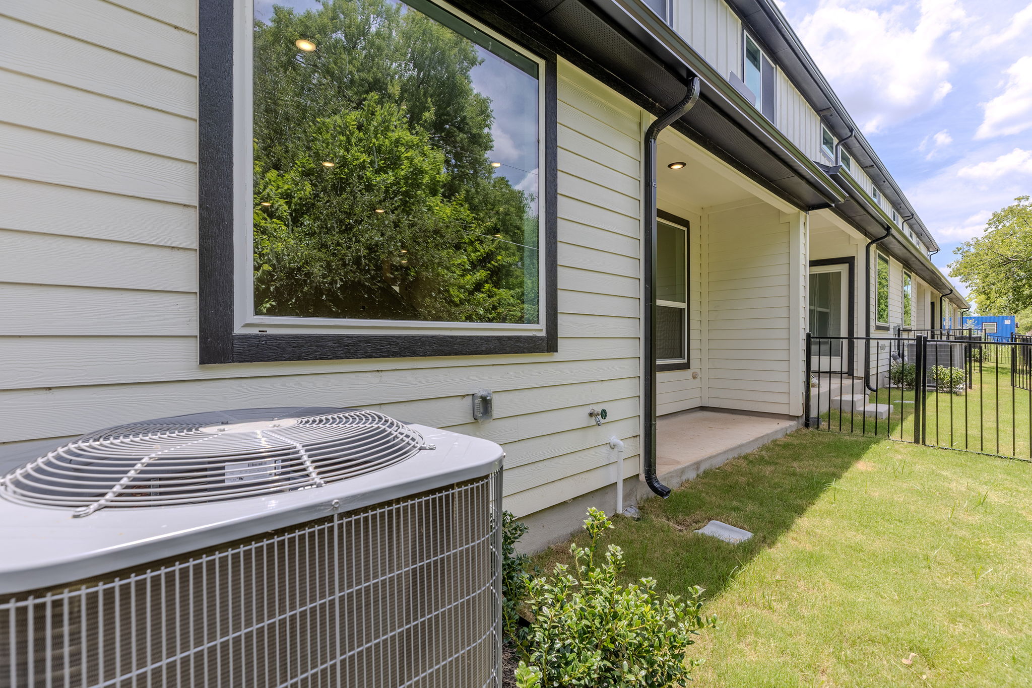 2600 Gattis School Road, Unit 1002 Round Rock, TX 78664 - Photo 34 of 40 Clean lines and a modern facade define this appealing residence, with a well-maintained lawn.