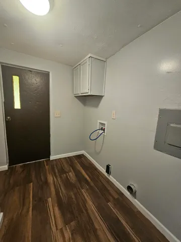 a view of a room with rack on the wall