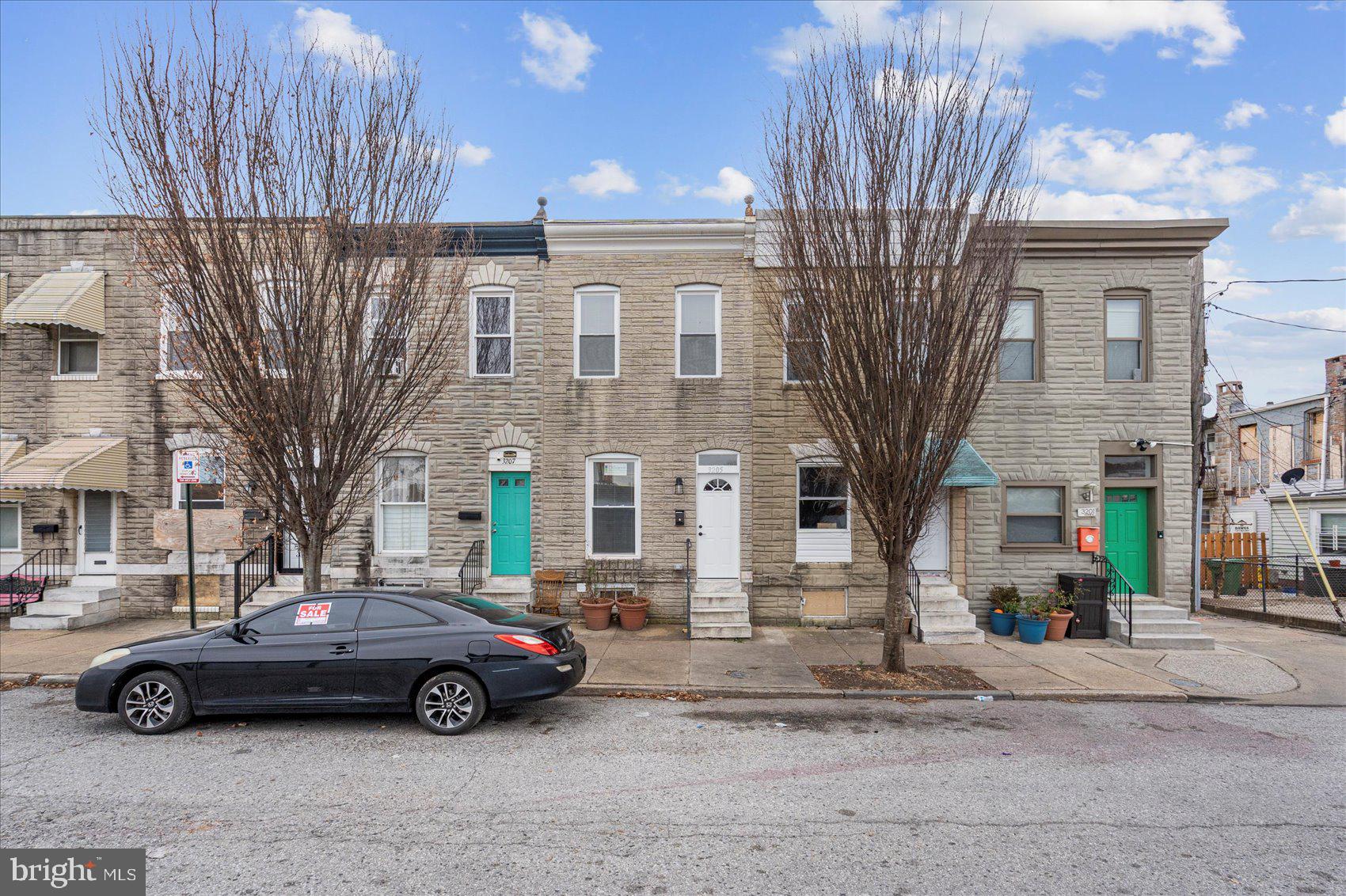 3205 Esther Place Baltimore, MD 21224 - Photo 2 of 32 a view of street with parked cars