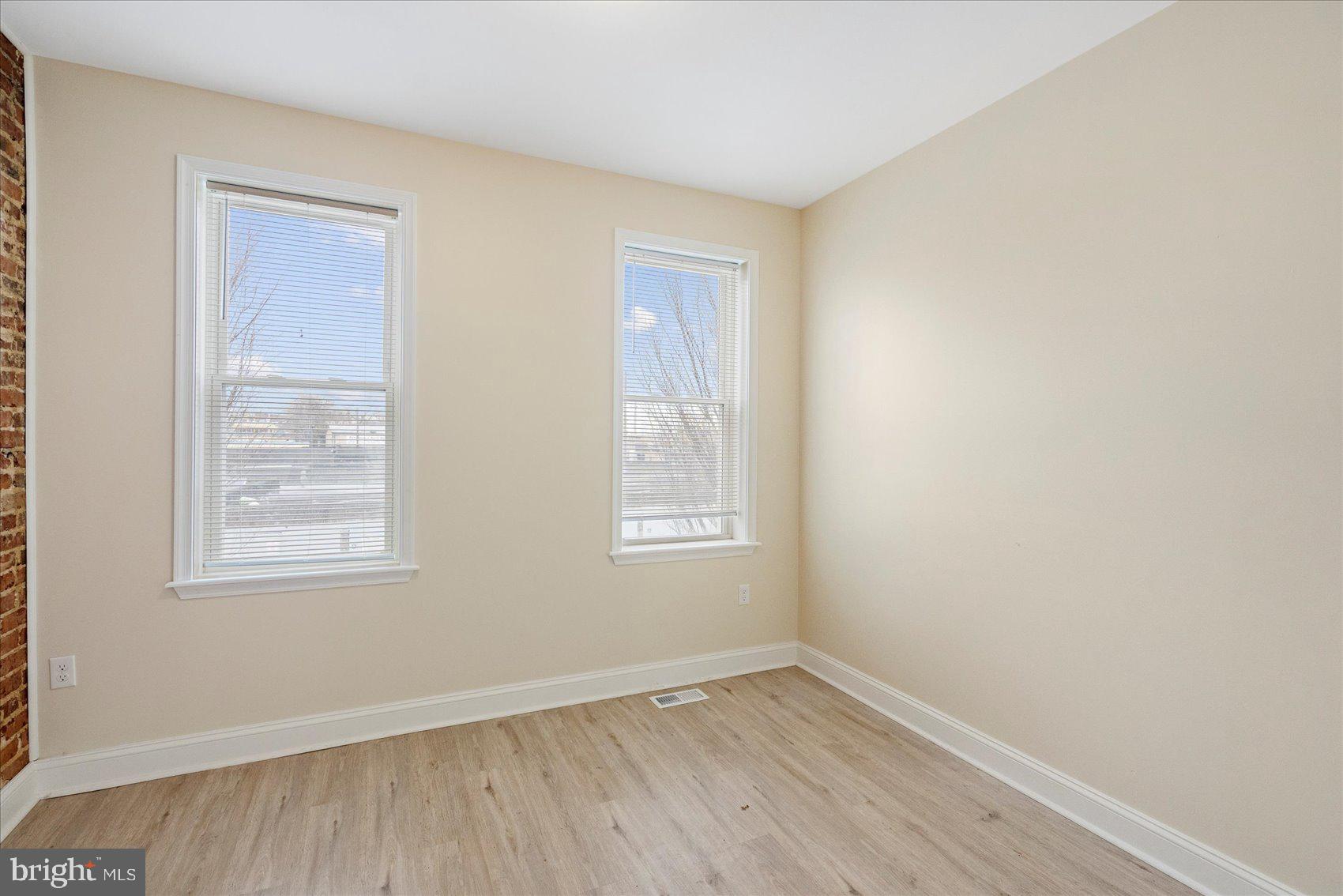 3205 Esther Place Baltimore, MD 21224 - Photo 6 of 32 an empty room with a window