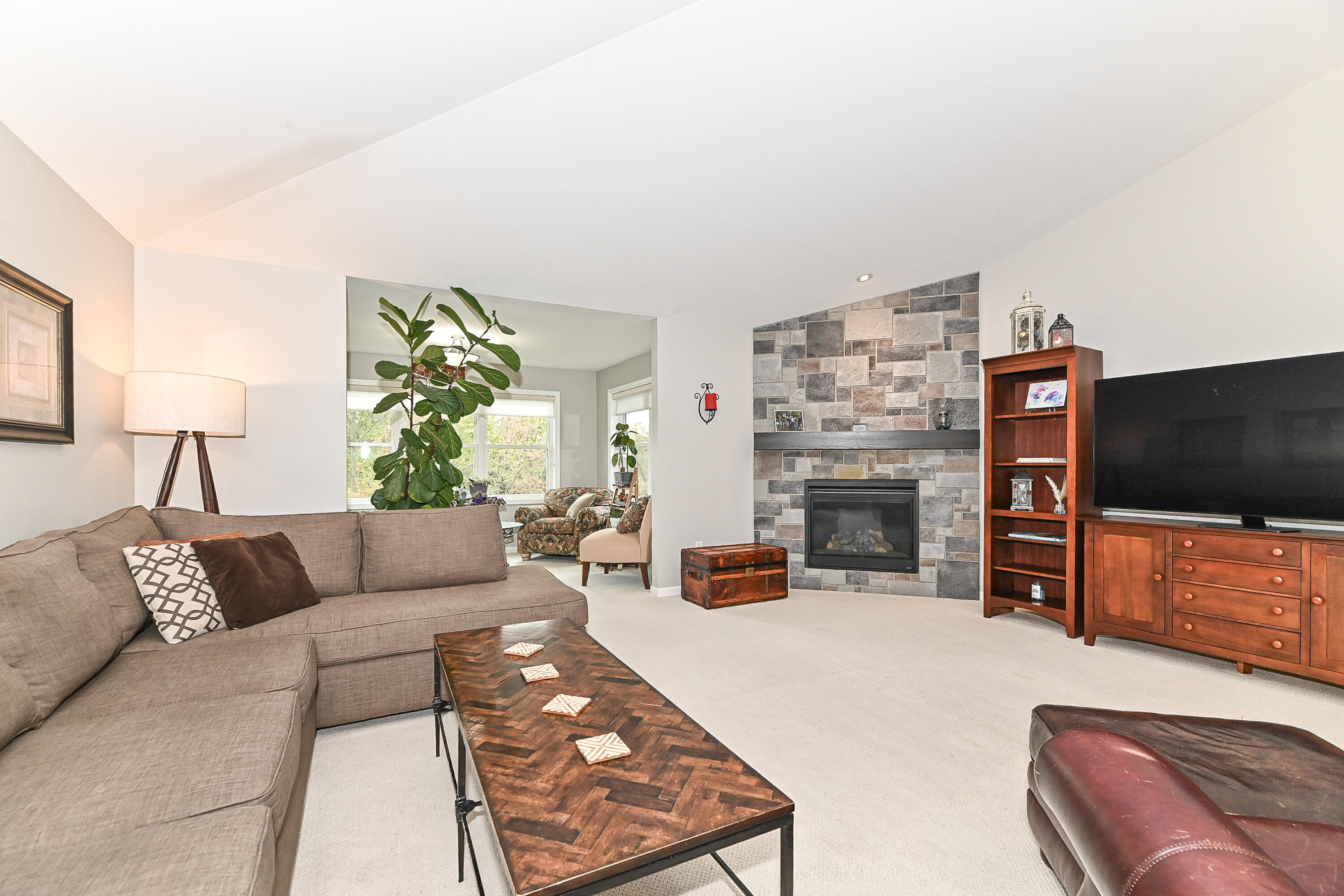 317 Trailview Crossing, Unit 15 Waterford, WI 53185 - Photo 14 of 40 to sunroom