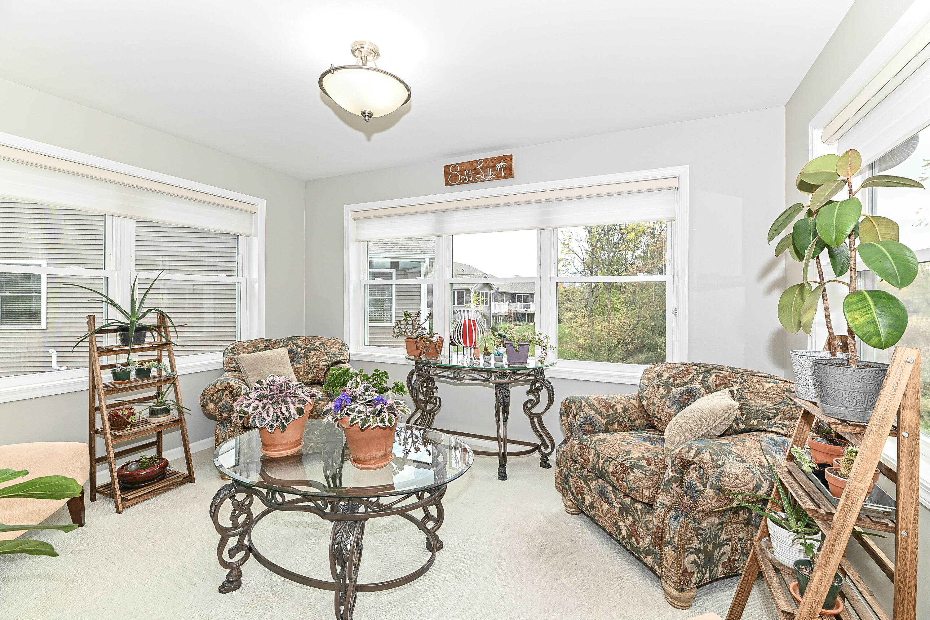 317 Trailview Crossing, Unit 15 Waterford, WI 53185 - Photo 15 of 40 sunroom