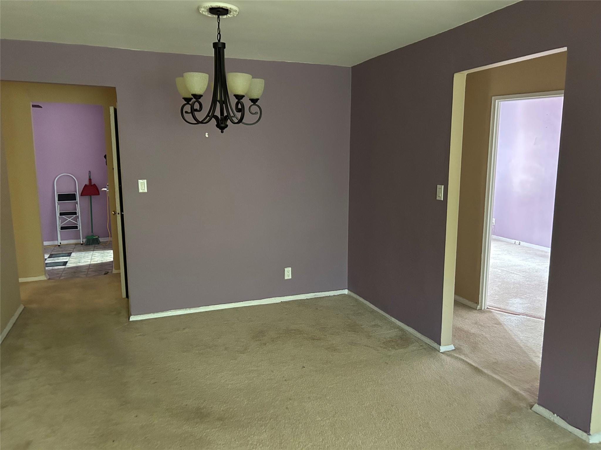 4265 Webster Avenue, Unit 7D Bronx, NY 10470 - Photo 5 of 14 a view of a hallway with a chandelier
