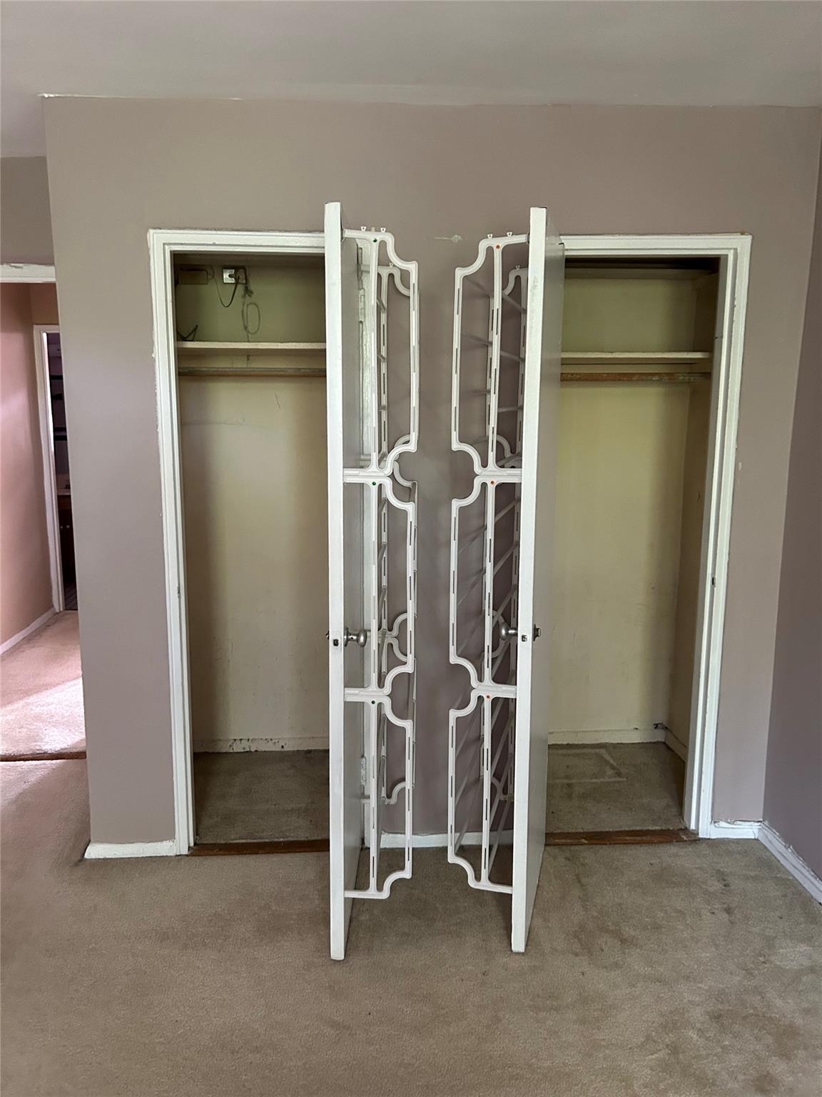 4265 Webster Avenue, Unit 7D Bronx, NY 10470 - Photo 9 of 14 a view of an empty room with wooden floor and a cabinet